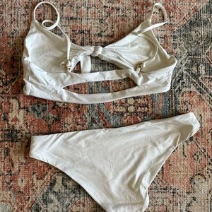 Small all white lspace swim suit top and bottom. Worn once for bachelorette.